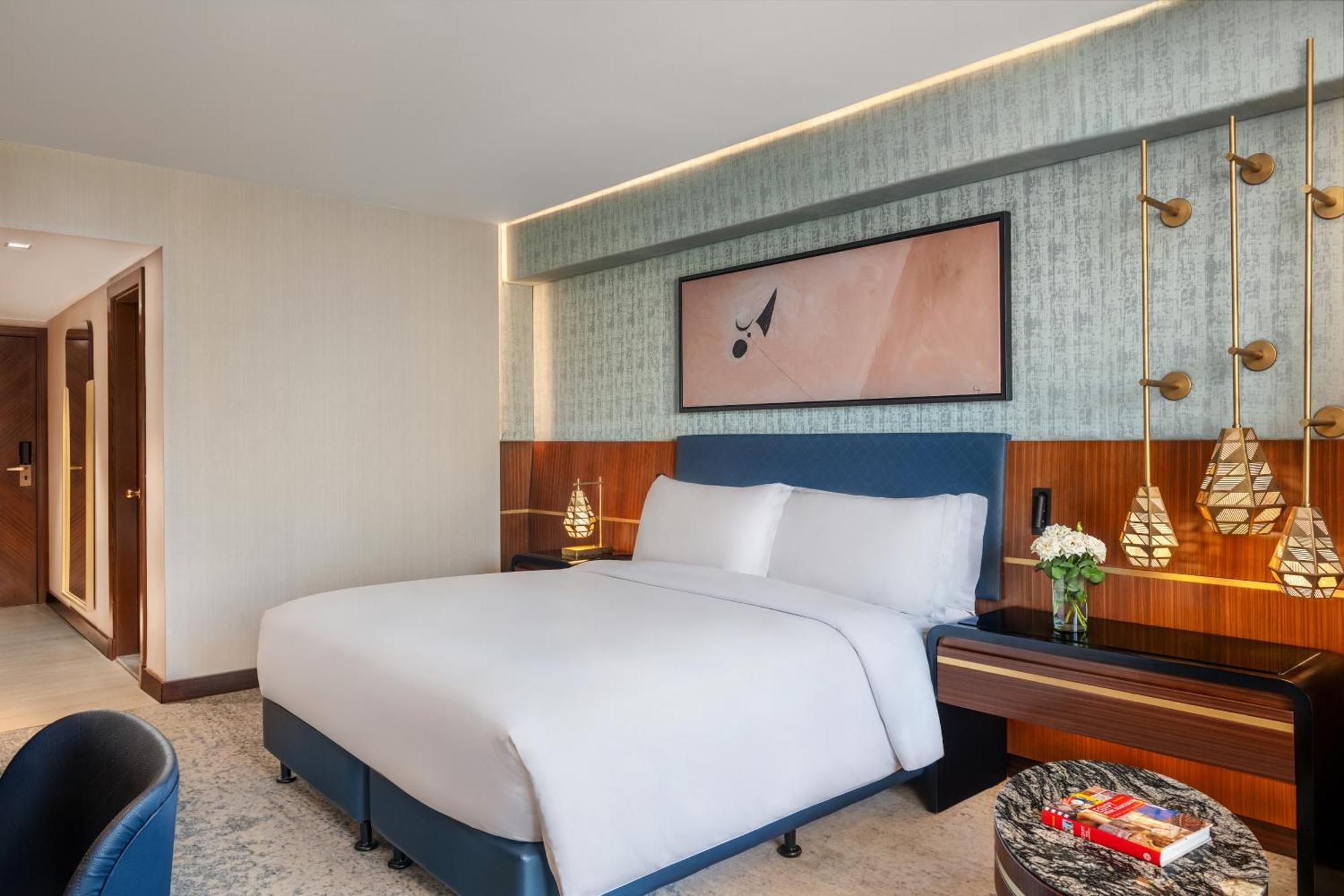 Hotel Sofitel Cairo Downtown Nile Exterior foto A bedroom at the hotel